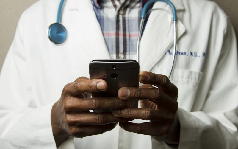 Doctor using a mobile device