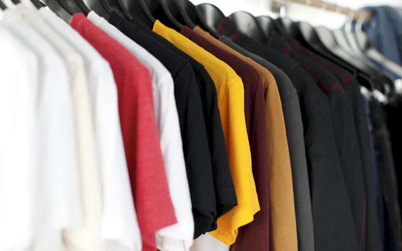 Rack of shirts in a range of colours